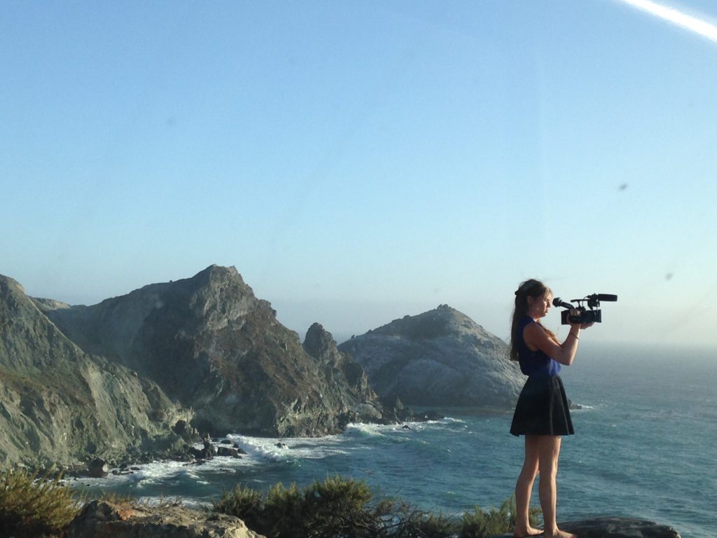 Alyssa filming while on the Pacific Coast Highway